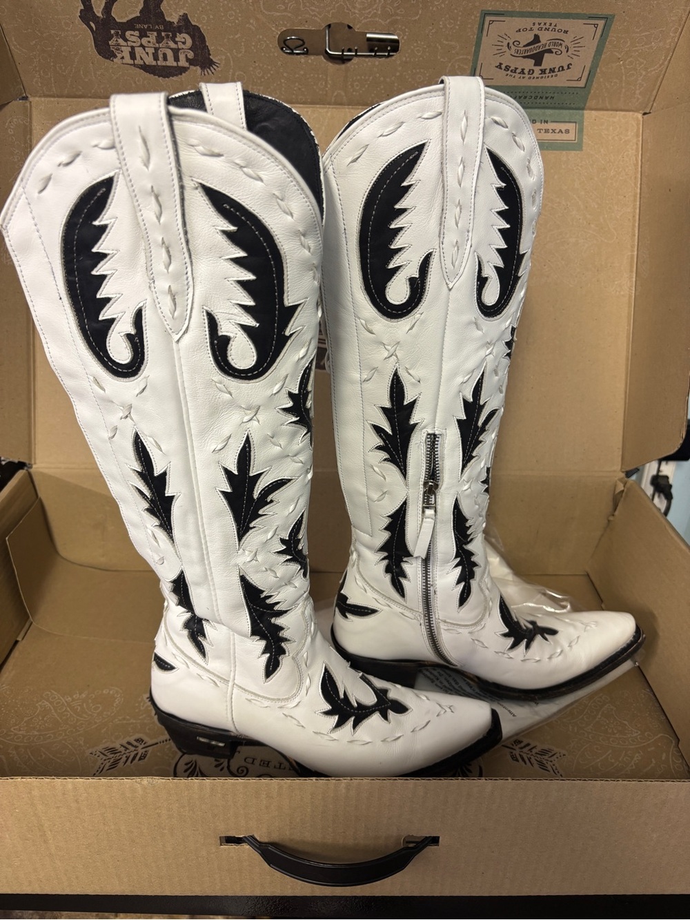 Lane “Junkyard Gypsy” Reverie Knee High Corset Boots in Newsprint.
